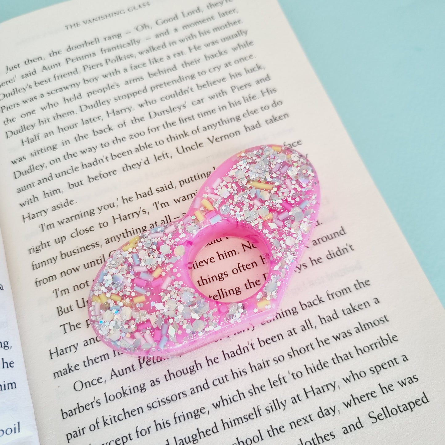 Resin thumb page holder