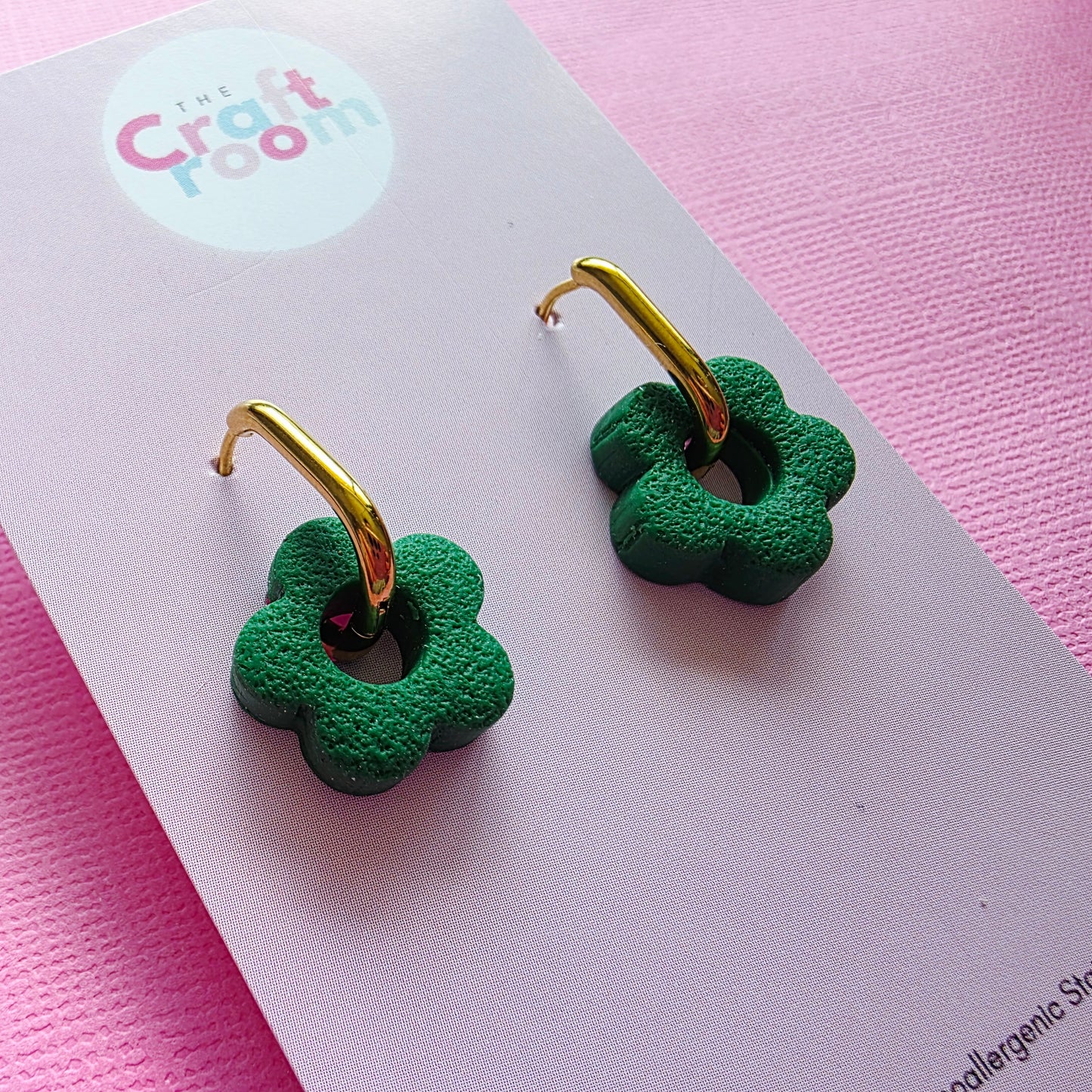 Flower olive oval huggie (gold)