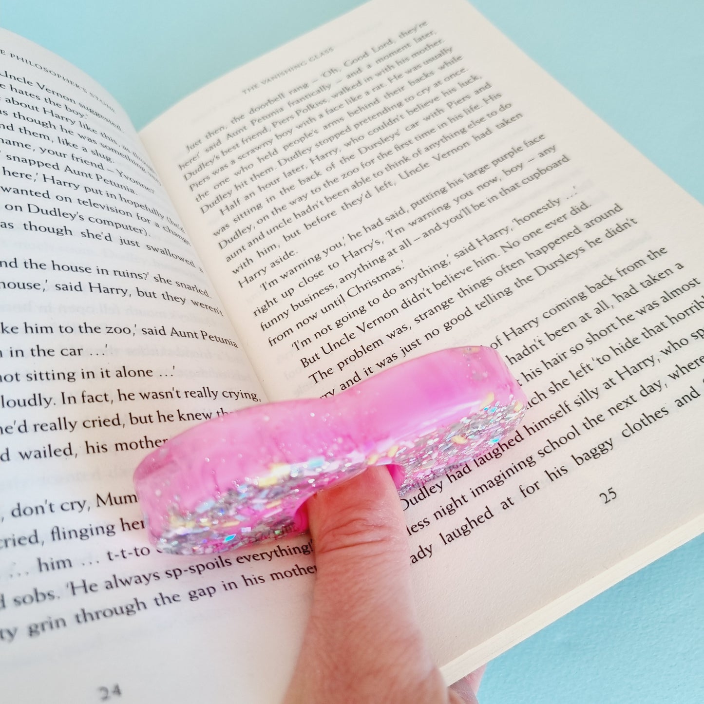 Resin thumb page holder