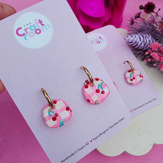 Midi cherry huggie hoop