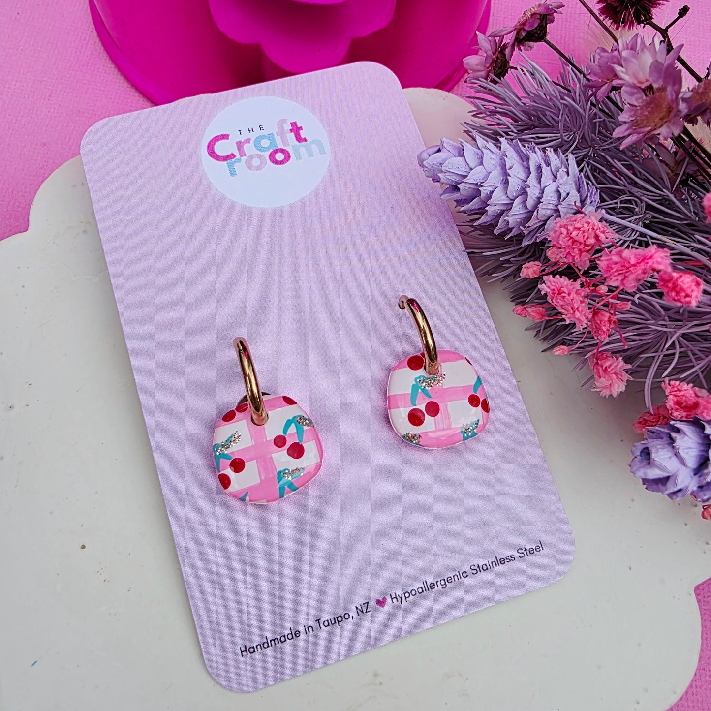 Midi cherry huggie hoop