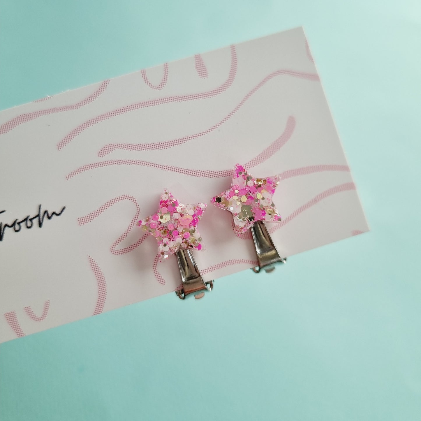 Clip on earrings (pink star)