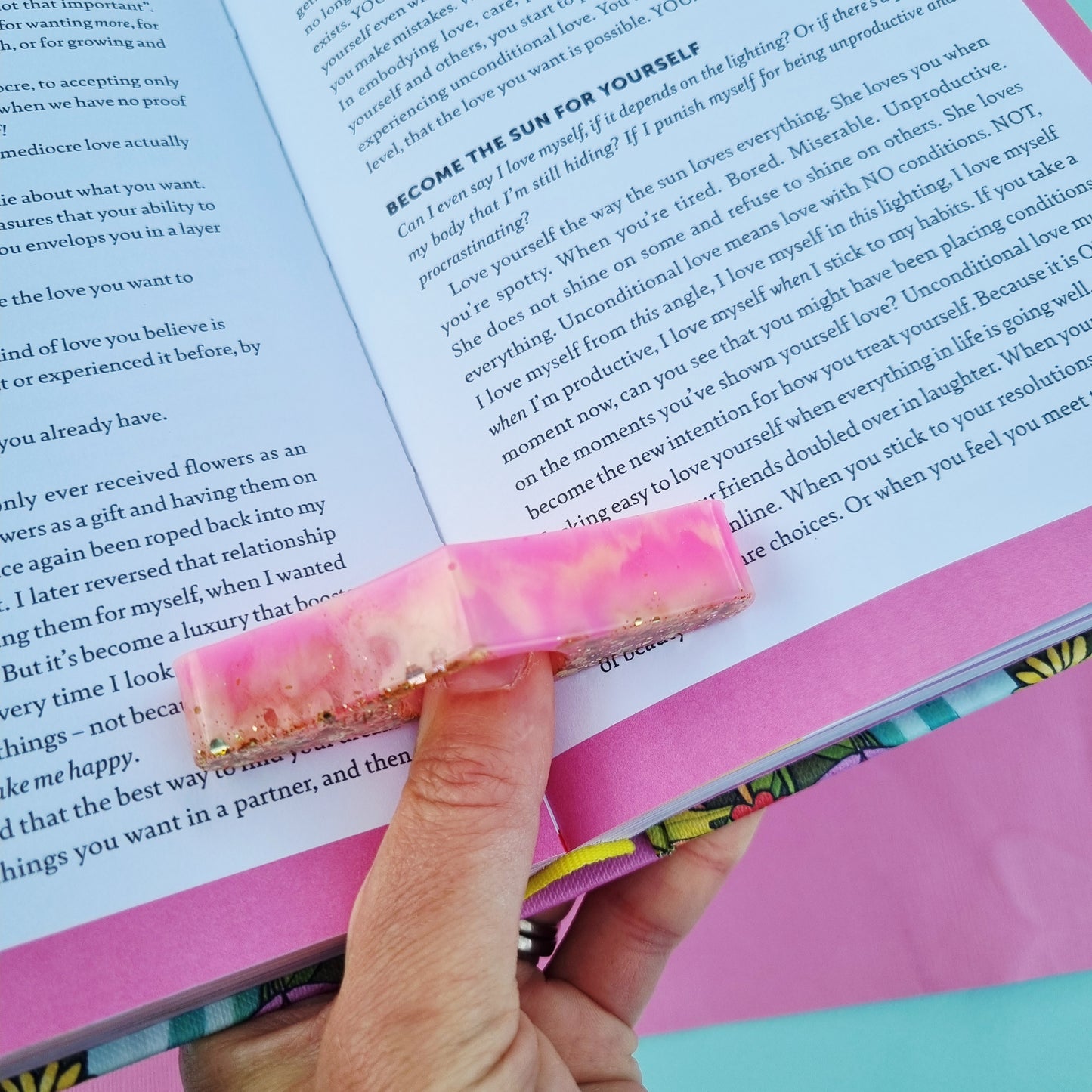 Resin thumb page holder