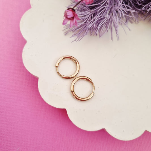 Huggie hoop rose gold